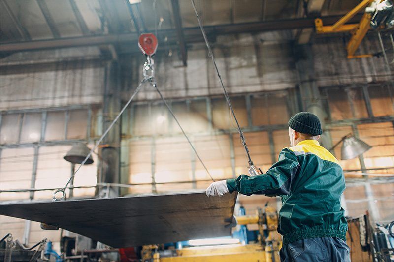 below the hook lifting device or fixture